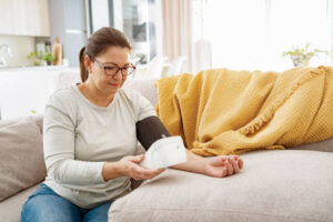 Using a remote blood pressure monitoring device between clinic visits can help patients manage hypertension.